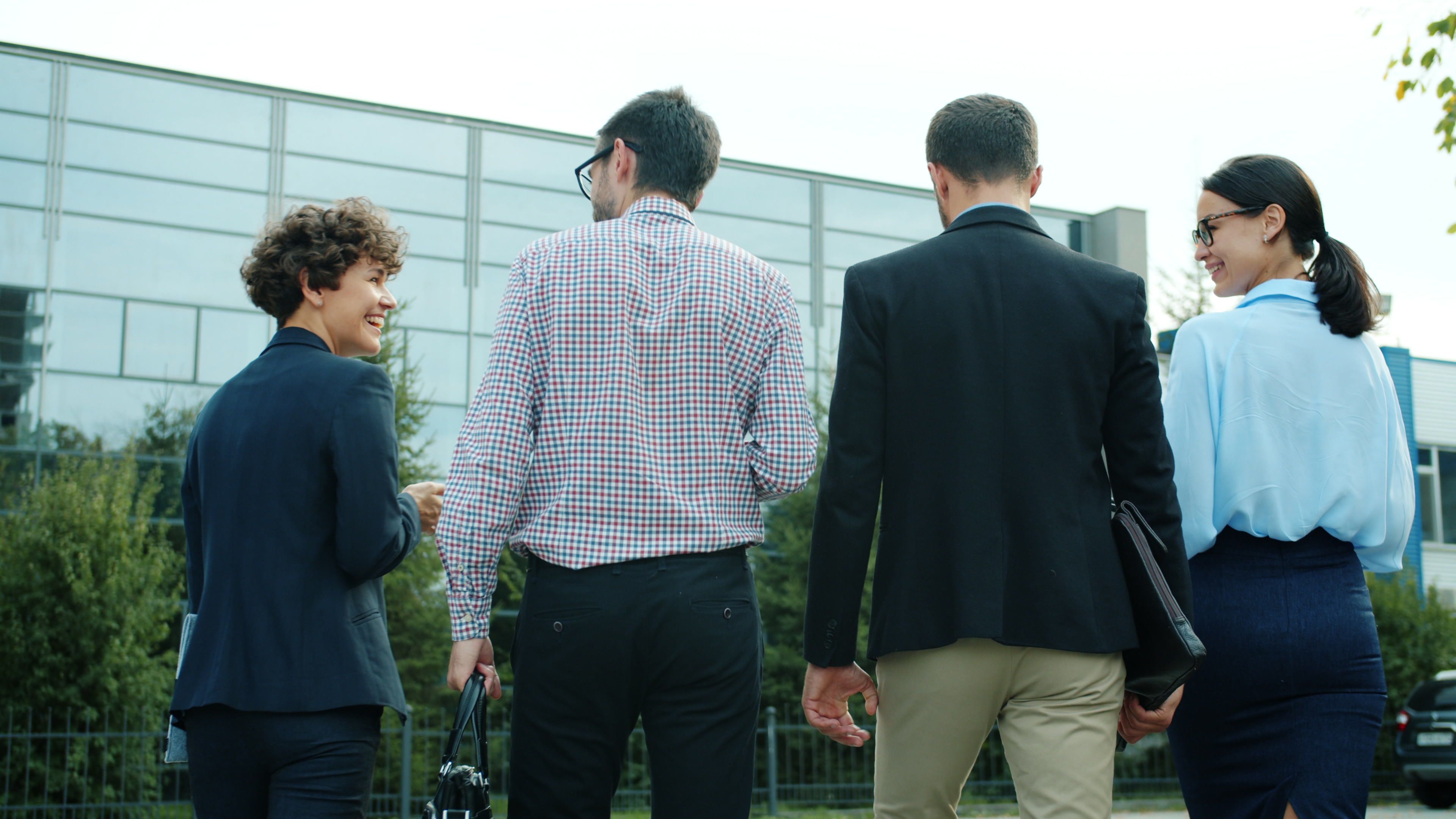 Professionals moving forward together during a career transition